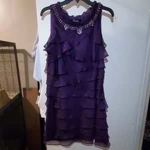 Ruffled dress with beading detail